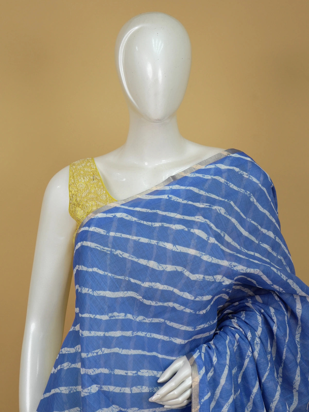 Blue and white leheriya batik linen cotton saree with golden zari border and floral pallu
