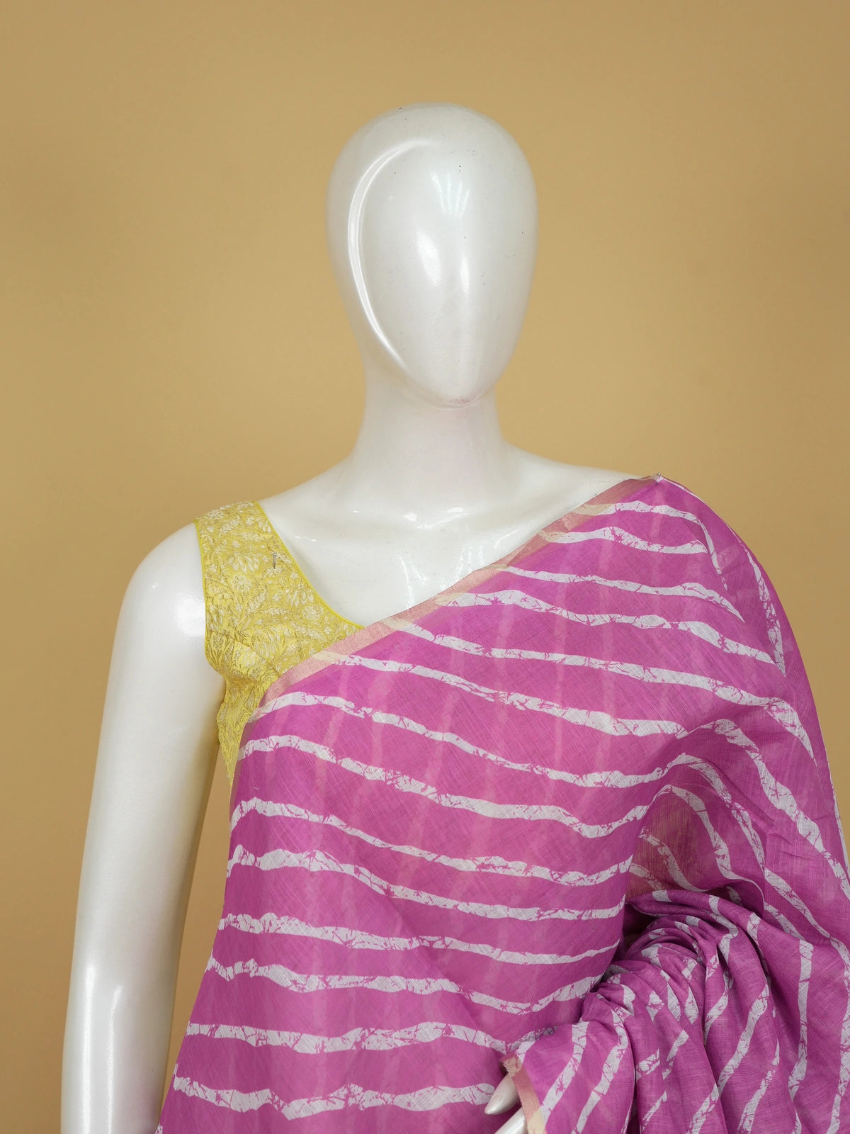 Pink and white leheriya linen cotton saree with batik floral pallu and gold zari border