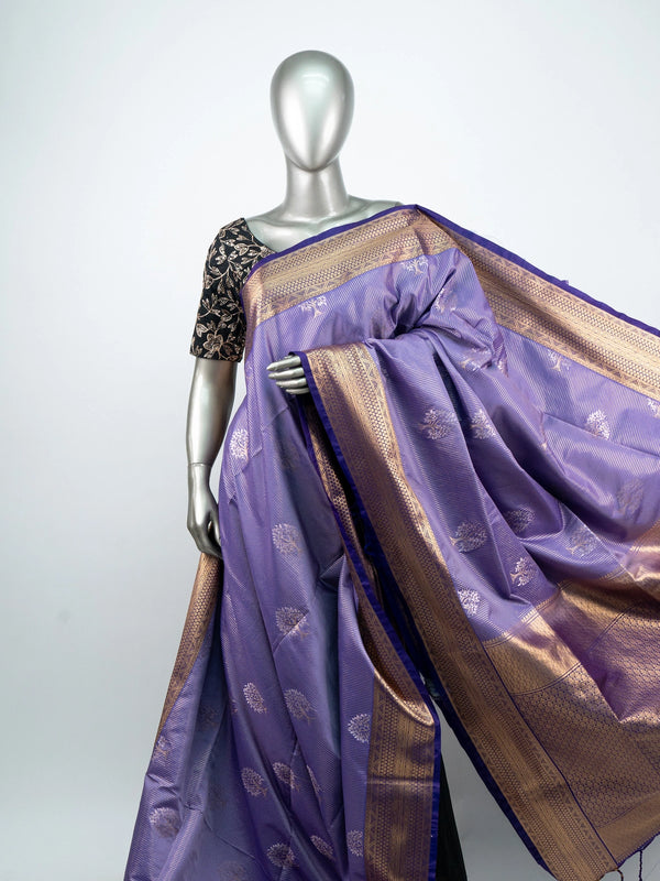 Lavender semi silk saree with Vaira Oosi pinstripe weave, gold zari tree buttas and contrast navy zari border