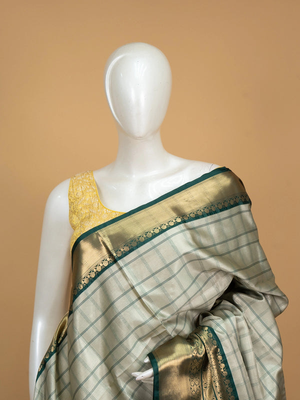 Grey and green checked Kanchi semi silk saree with green and gold zari border