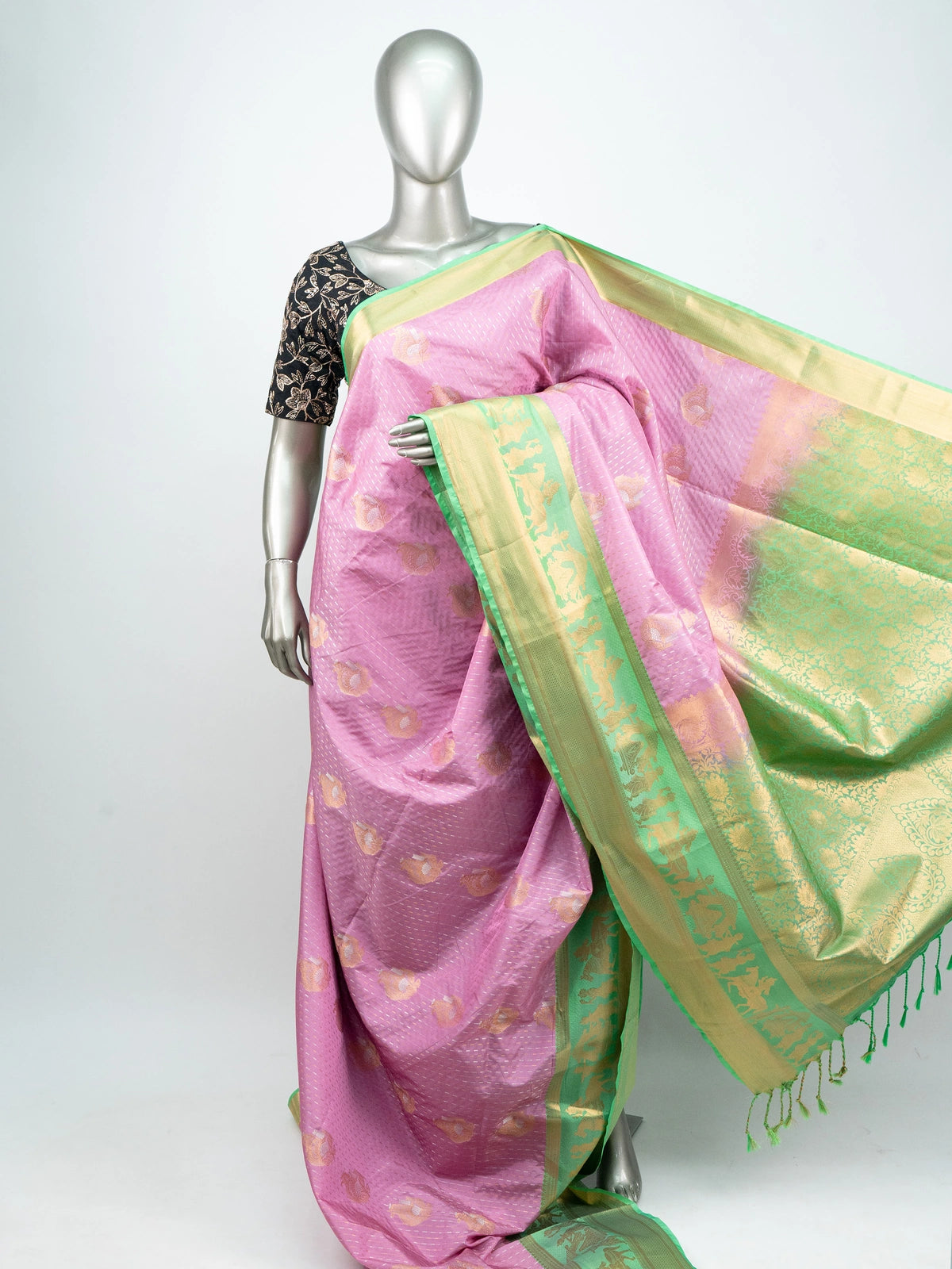 Pink soft silk saree with contrast green and gold zari border and floral zari pallu