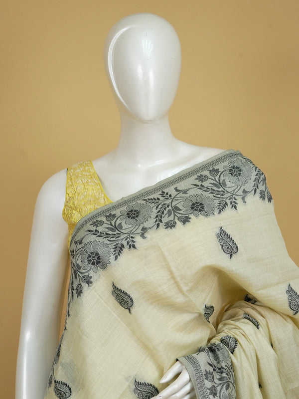 Cream linen cotton saree with grey floral border and peacock-deer motif pallu
