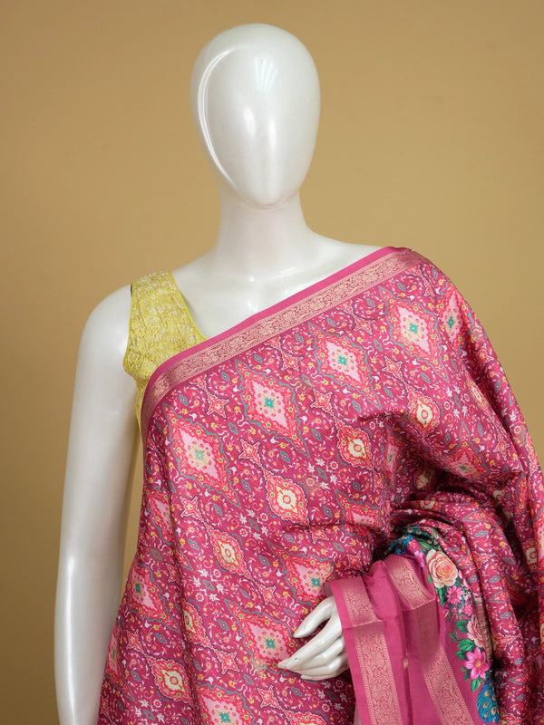 Pink Dola silk saree with patola print body, gold zari border and peacock floral pallu