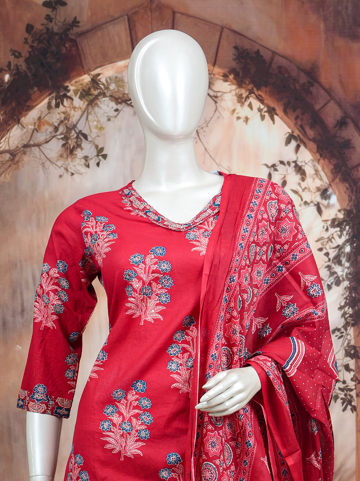 Red floral printed cotton kurti set with blue motifs, straight pants and Ajrakh-print dupatta
