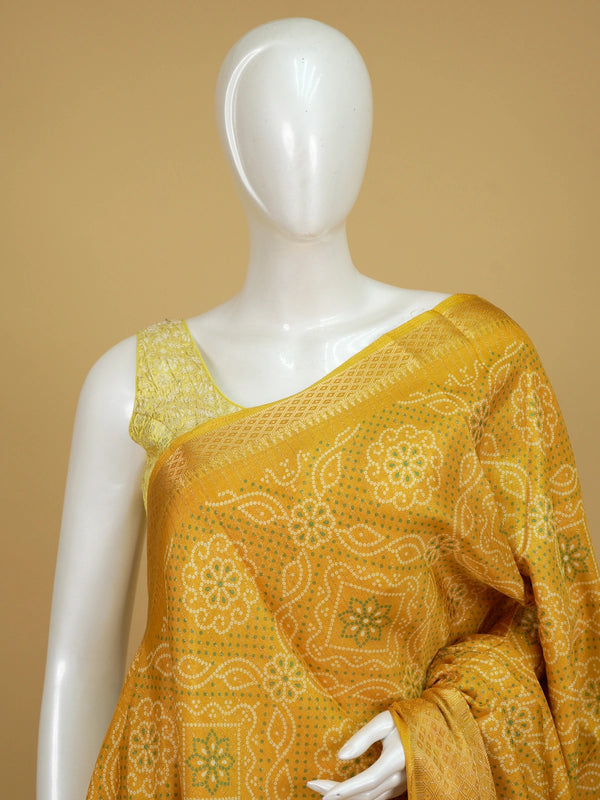 Mustard yellow bandhani print designer saree with gold zari border and banded pallu