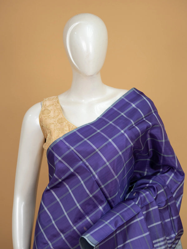 Violet banana silk saree with white and silver checks and contrast grey striped pallu