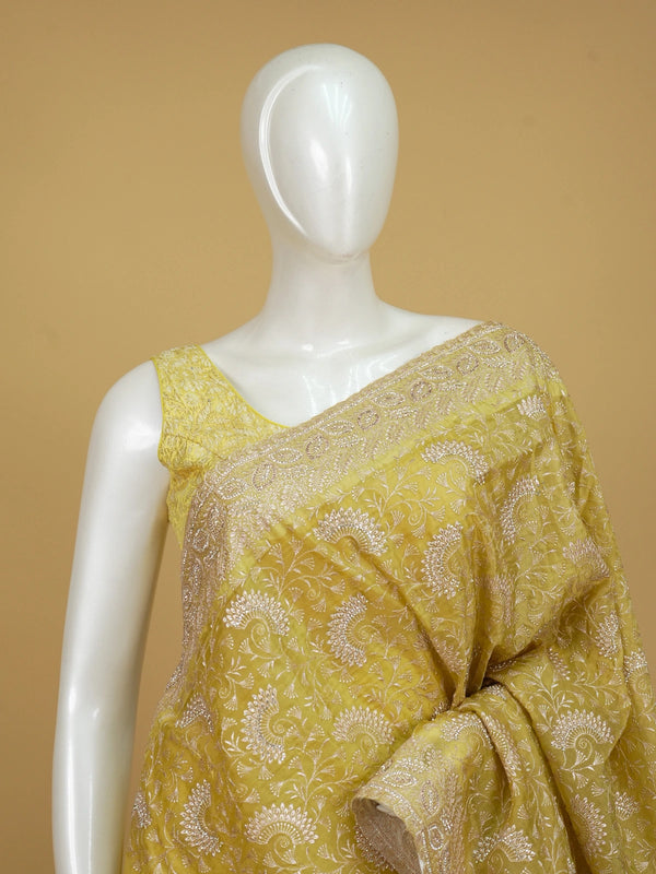Bright yellow designer art silk saree with all-over silver-gold embroidery, sequin work, and embroidered border