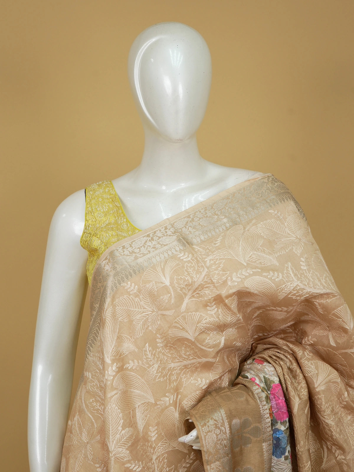 Beige and gold designer tissue saree with woven floral jaal and multicolour floral embroidery