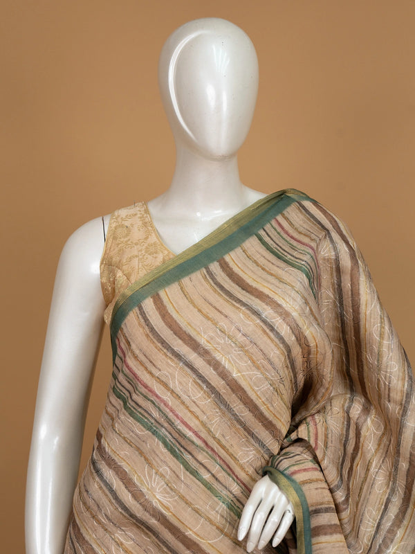 Beige and green linen cotton saree with striped body, floral iris pallu and green zari border