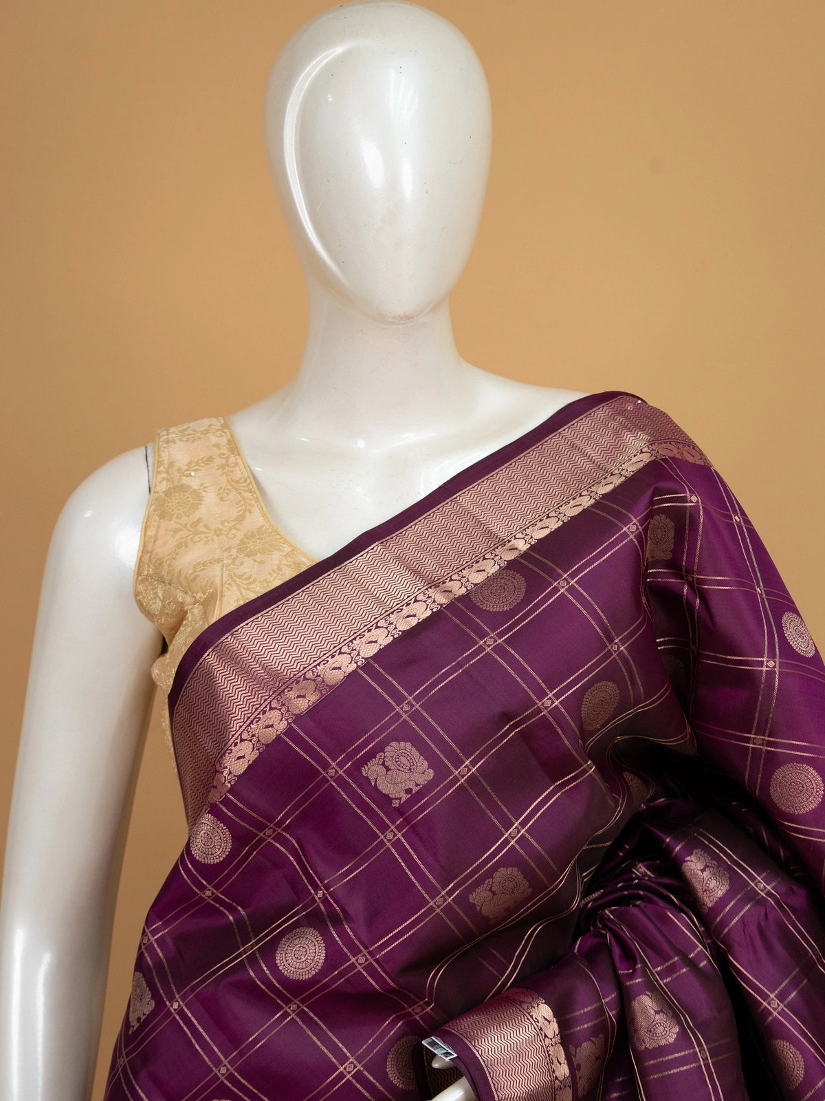 Wine purple pure Kanchipuram silk saree with gold zari checks, woven buttas and contrast zari border