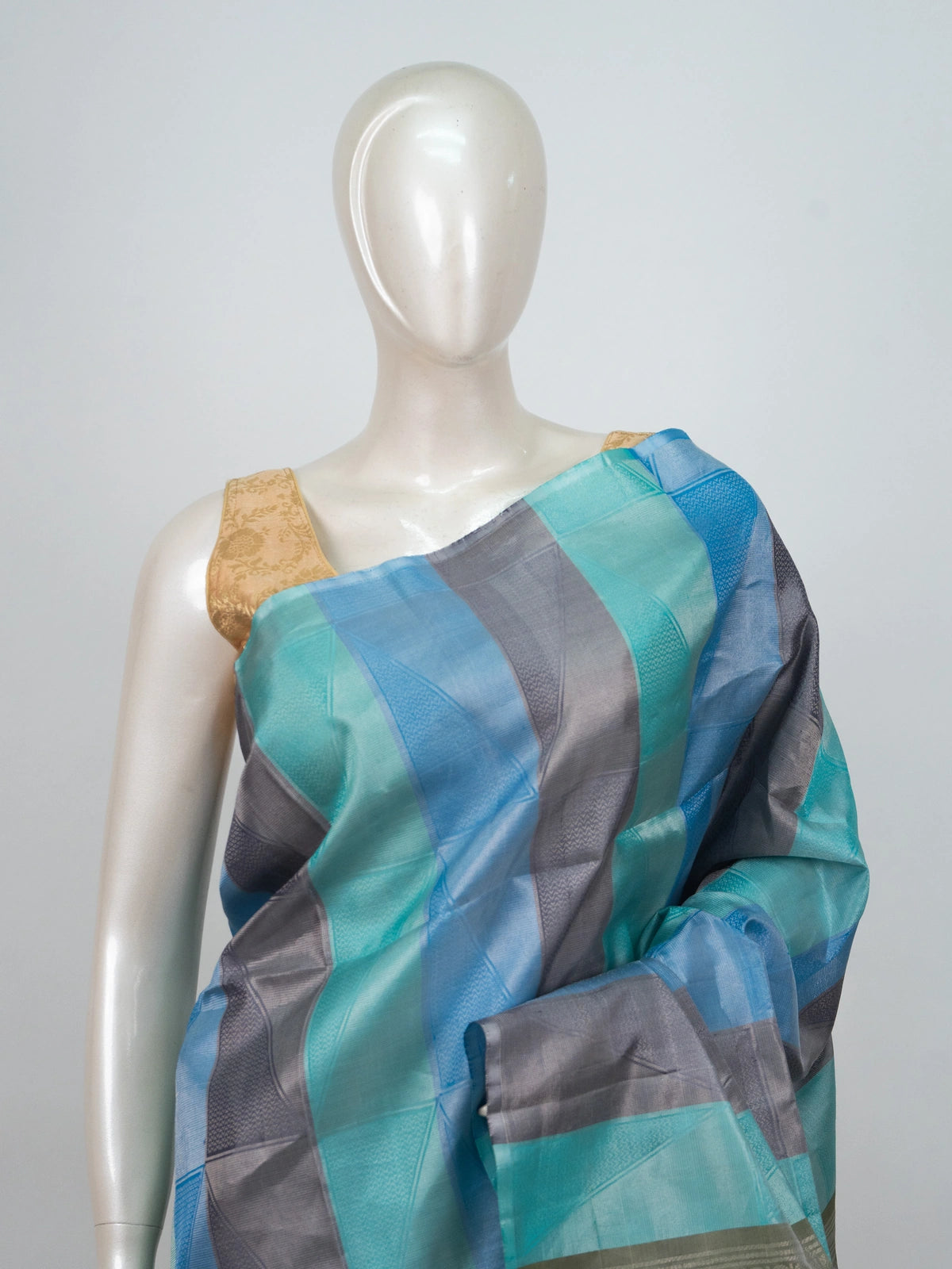 Blue and teal checked soft silk saree with contrast olive-green woven pallu and border