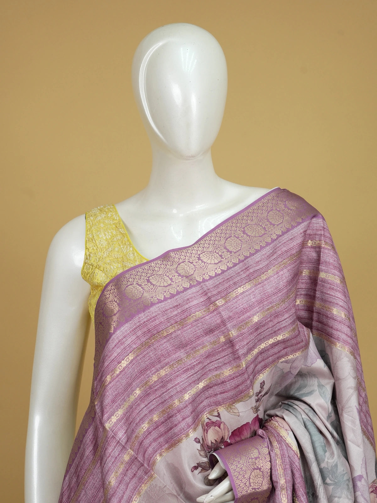 Lilac and mauve floral Dola silk saree with gold zari border and printed pallu