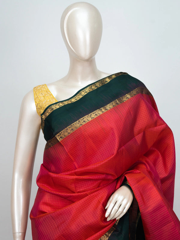 Red soft silk saree with contrast dark green gold zari border and woven zari pallu