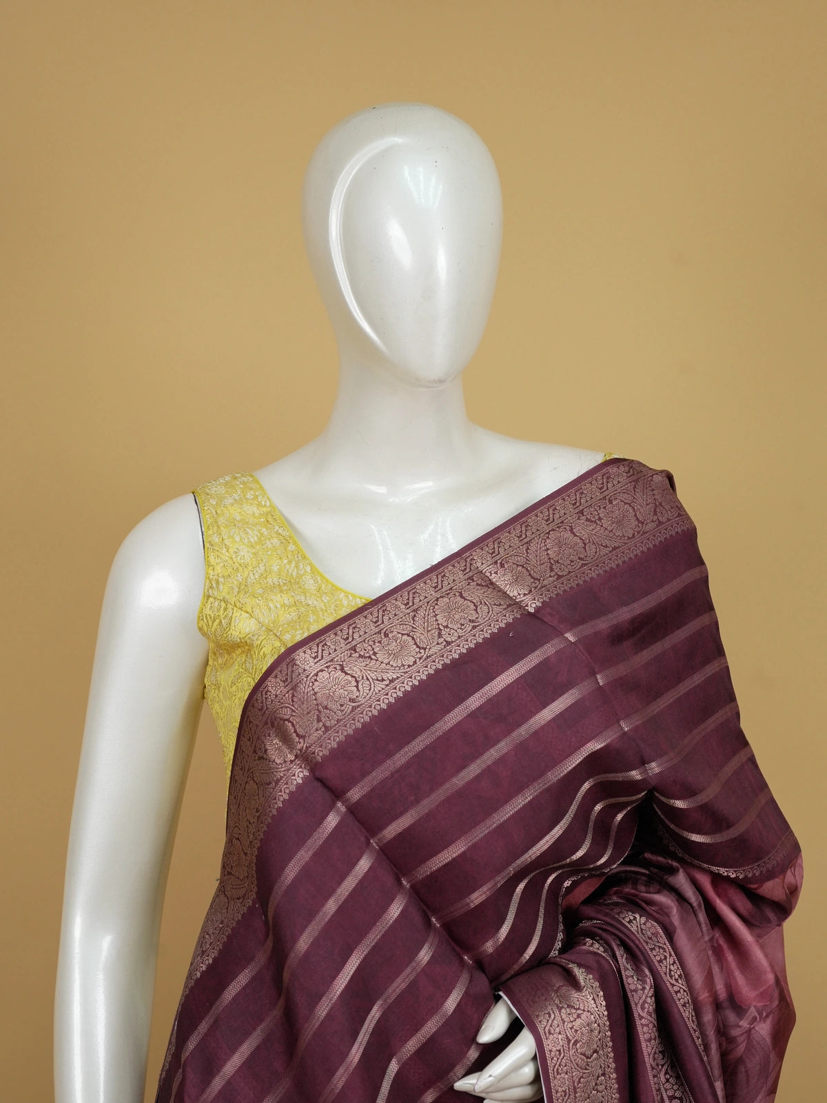 Wine semi tussar saree with gold zari stripes, floral print pallu and zari border