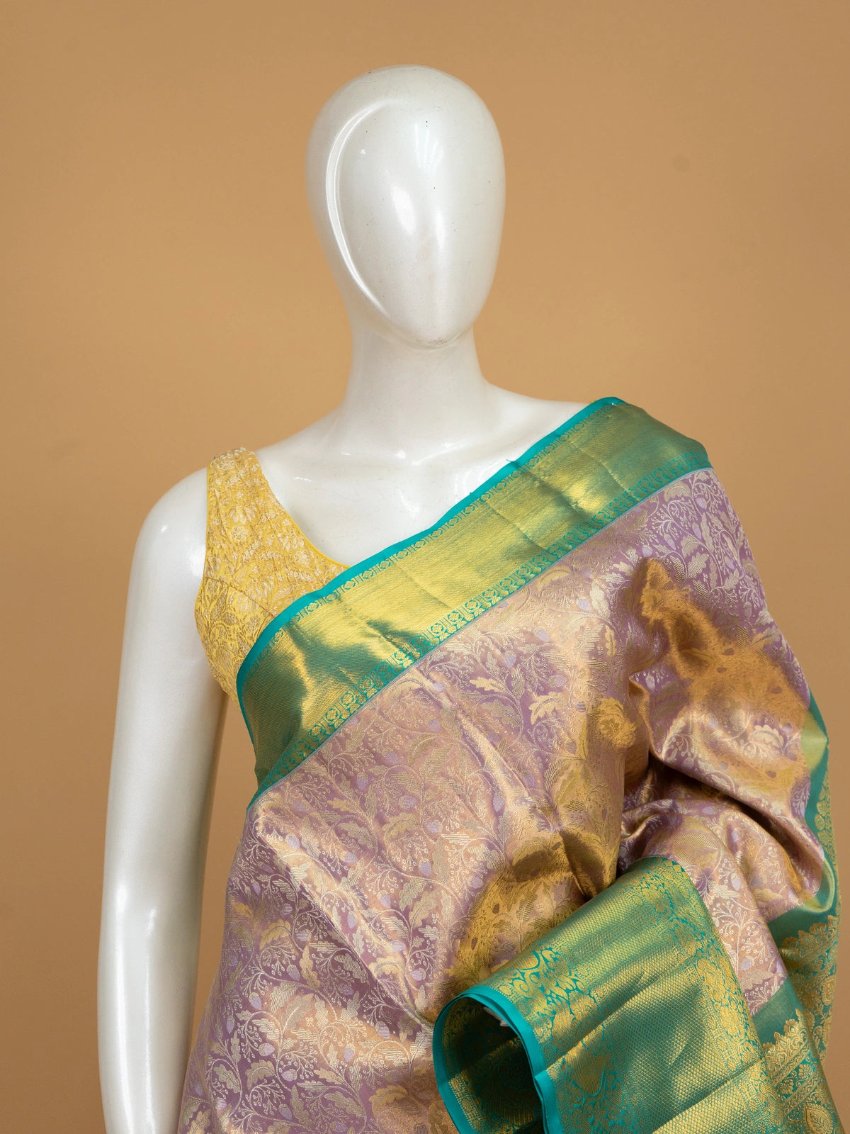 Lavender pure Kanchipuram silk saree with gold zari floral brocade and contrast teal-green gold border