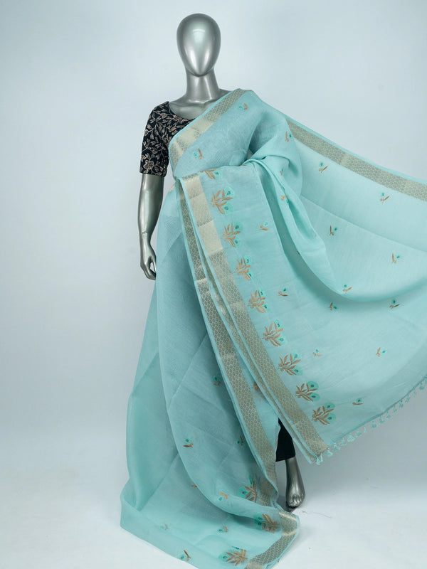 Sky blue linen cotton saree with gold zari border and embroidered floral buttas