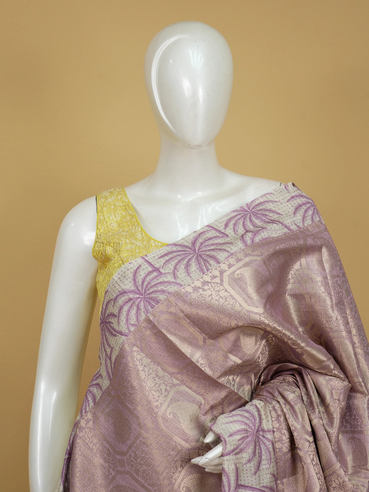Mauve designer tissue saree with gold zari paisley weave and palm-tree print border