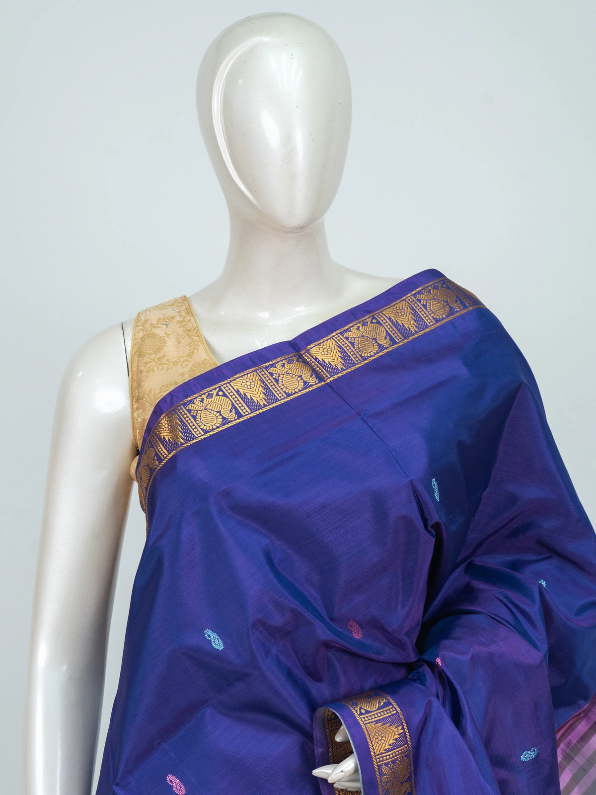 Royal blue Banana silk saree with contrast sky blue pallu and gold zari border