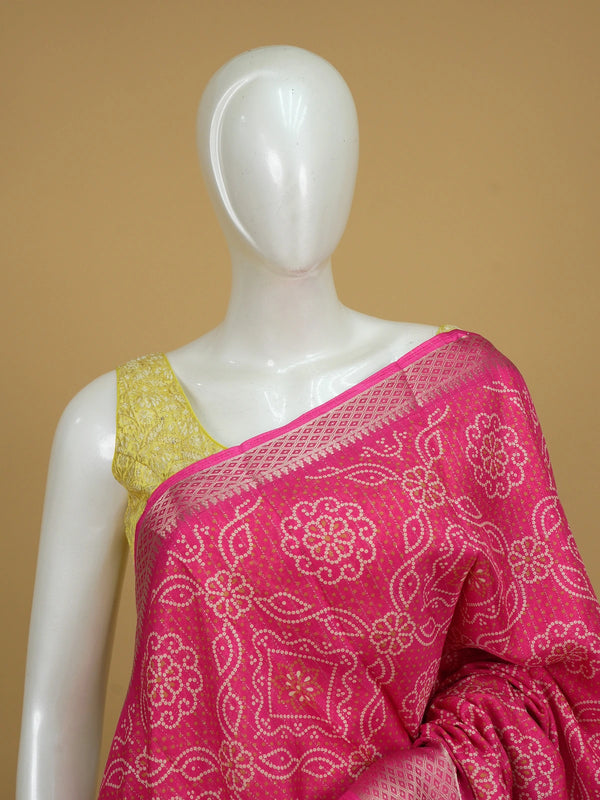 Pink Dola silk saree with cream bandhani-style print and contrast zari diamond border