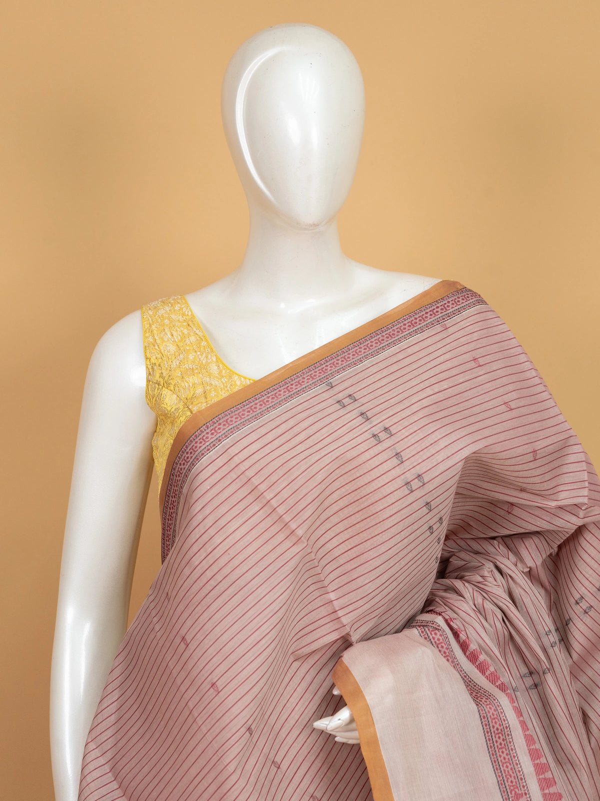 Dusty pink semi raw silk saree with maroon stripes, mustard border and woven paisley pallu