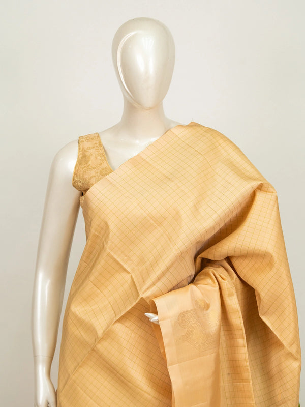 Cream Kanchipuram pure mix saree with gold zari checks and contrast lime green zari pallu and border