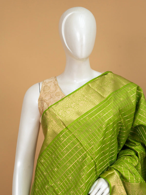 Parrot green pure Kanchipuram silk saree with gold zari checks and ornate zari border