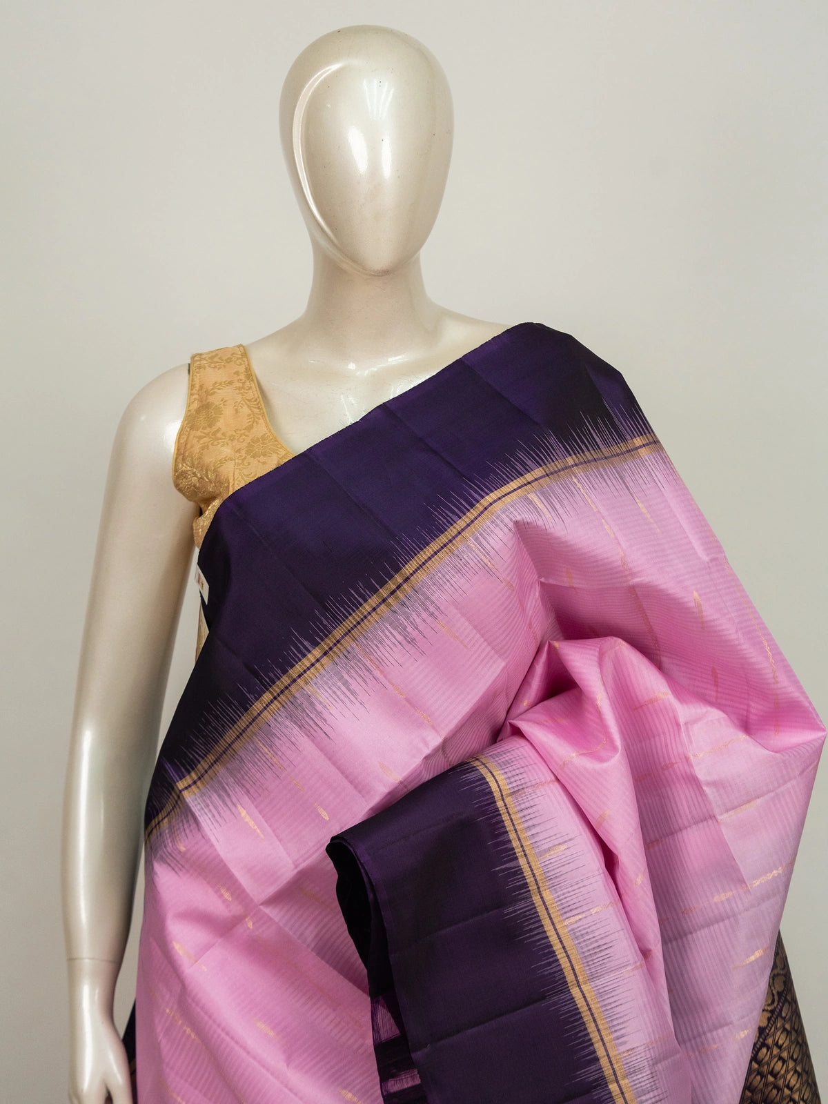 Pink pure soft silk saree with dark purple contrast temple zari border and gold zari brocade pallu