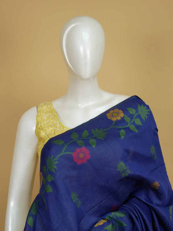 Royal blue linen cotton saree with multicolour woven floral motifs and a floral vine pallu