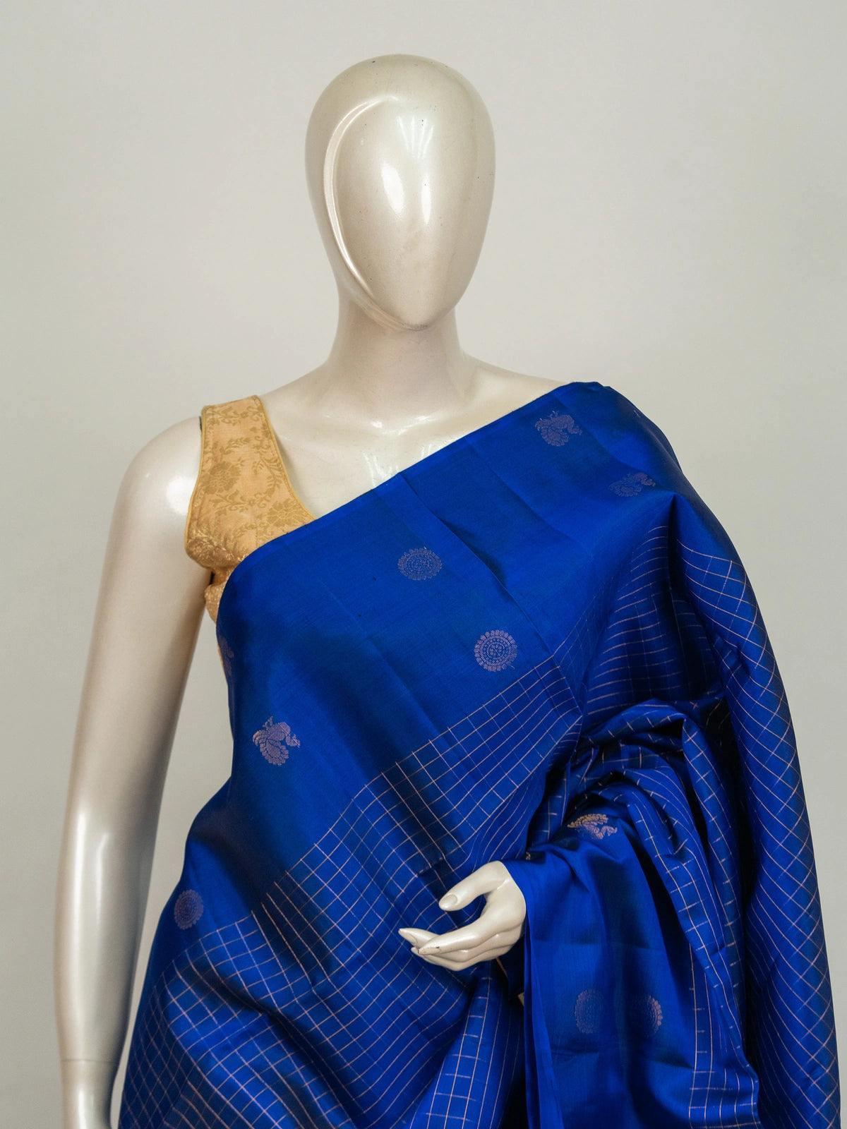 Royal blue pure soft silk saree with gold zari checks, peacock buttas and zari border
