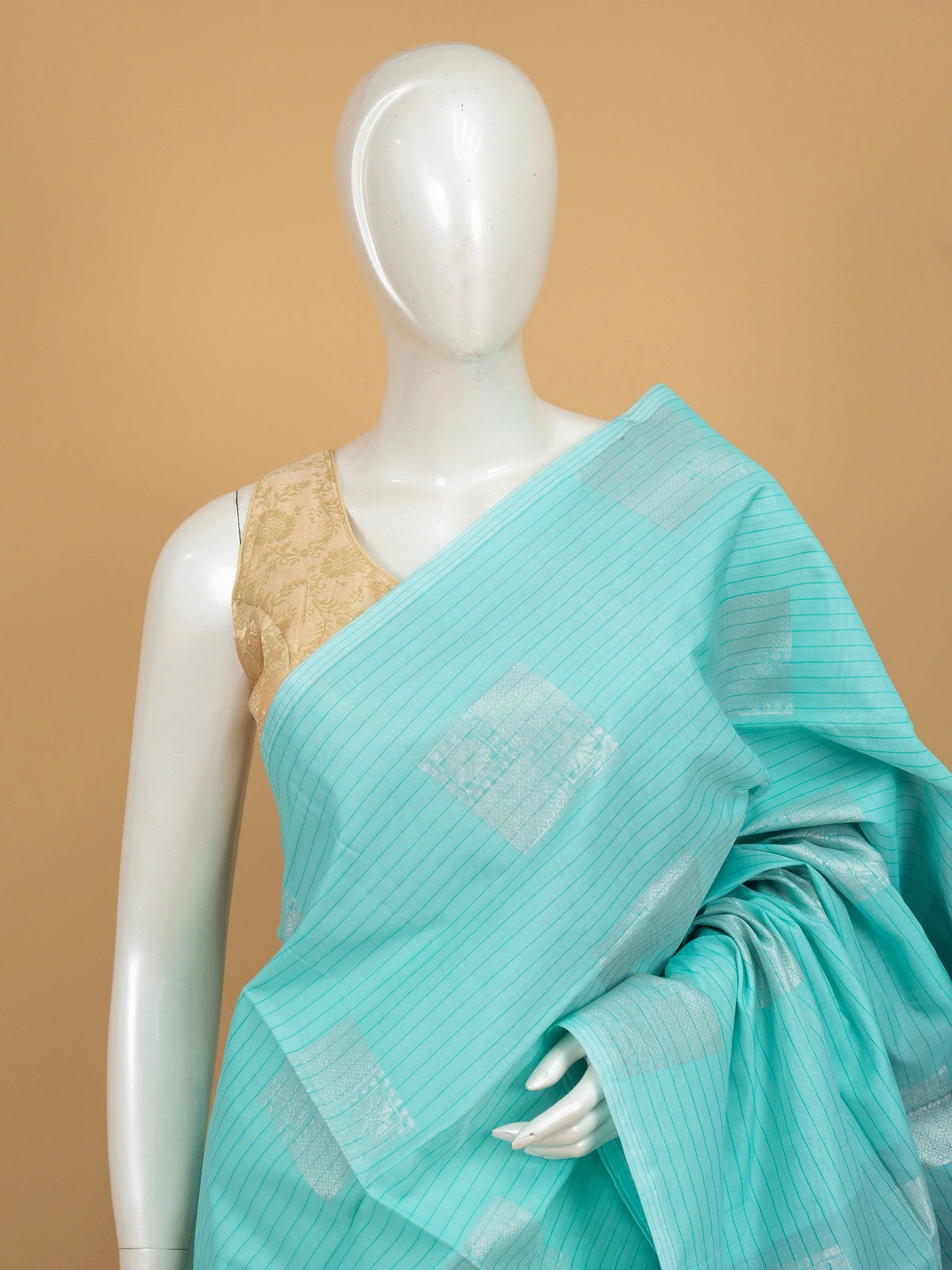 Aqua blue silk cotton saree with silver zari buttas and contrast grey-blue zari border