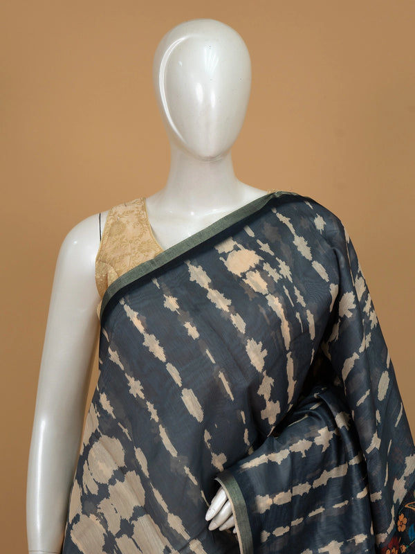 Charcoal grey shibori linen cotton saree with colourful floral pallu and green border