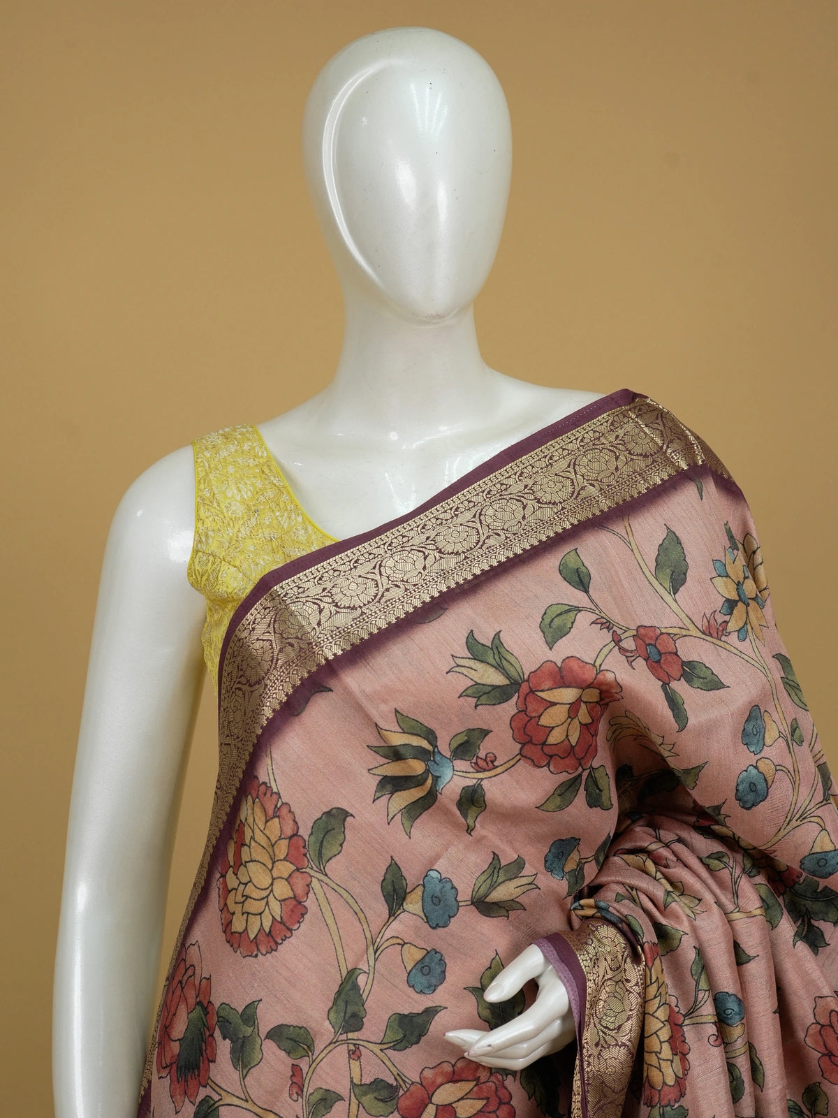 Dusty rose semi tussar saree with Kalamkari floral print, peacock pallu and maroon gold zari border