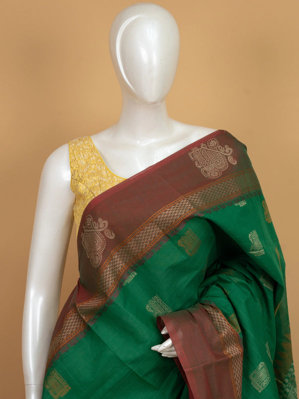 Green semi raw silk saree with contrast maroon gold zari border and woven butta motifs