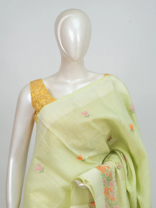 Pastel green linen cotton saree with pink and orange floral embroidery and cream contrast border