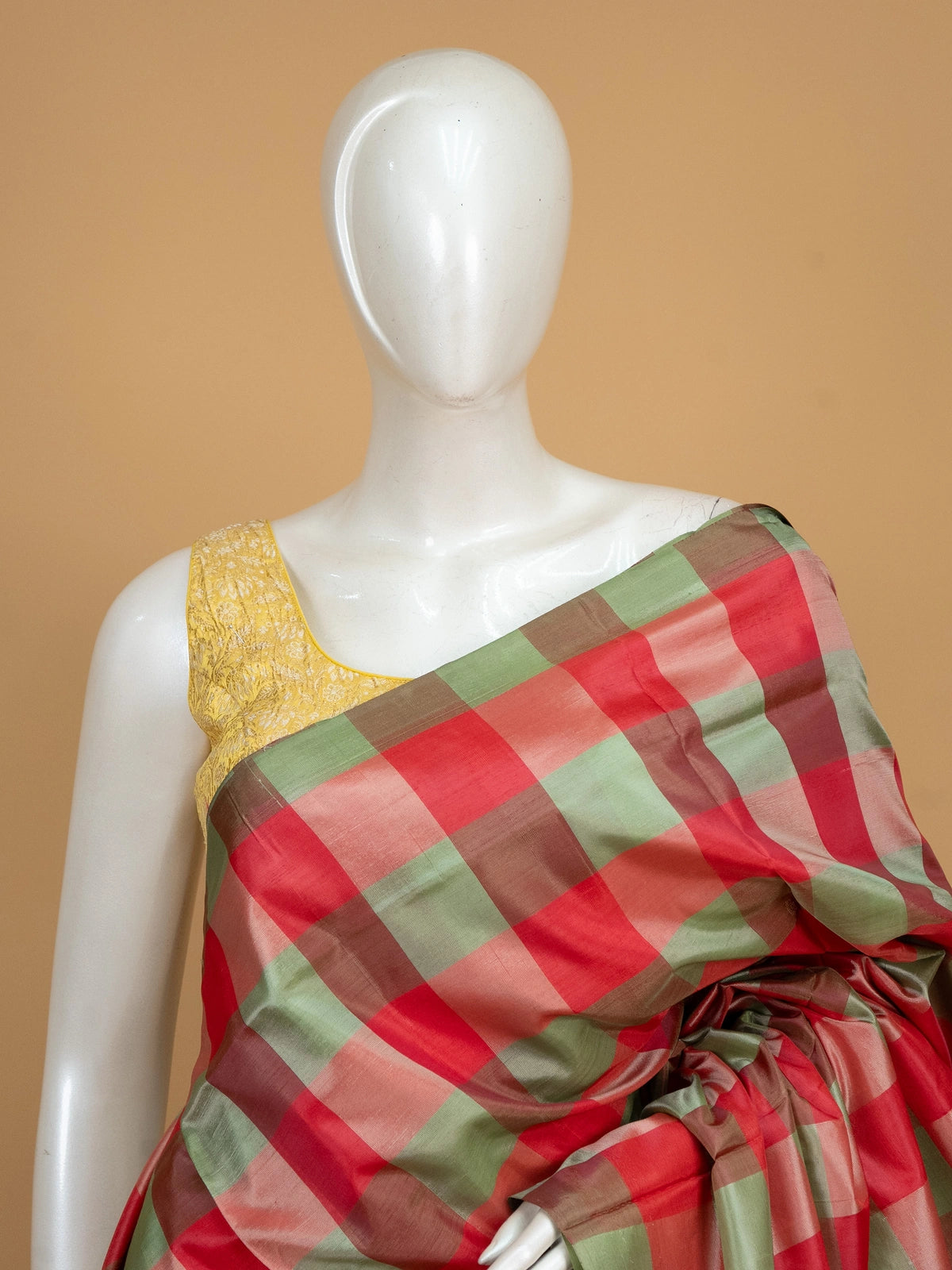 Red and green checked Banana silk saree with contrast light green paisley pallu and zari border