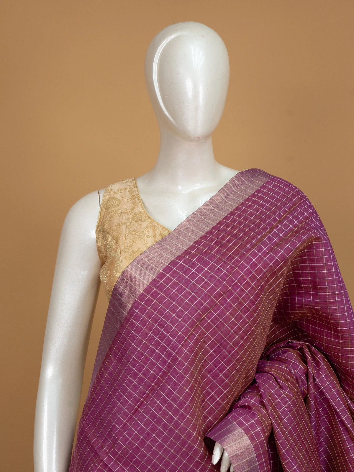 Magenta linen cotton saree with gold zari checks and contrast cream zari-striped pallu