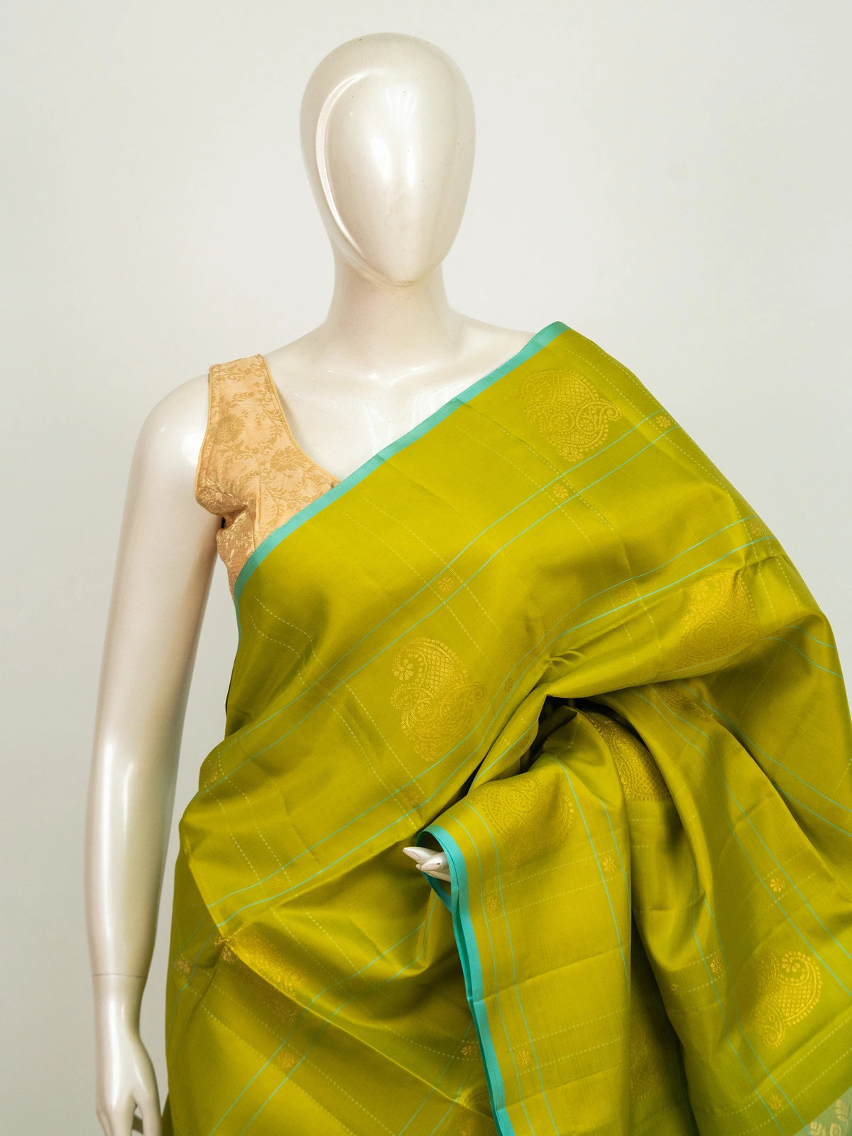 Mehendi green Kanchipuram Pure Mix saree with turquoise blue contrast border and gold zari buttas