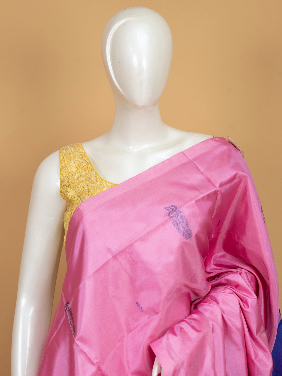 Pink banana silk saree with contrast blue pallu, butta motifs and striped border