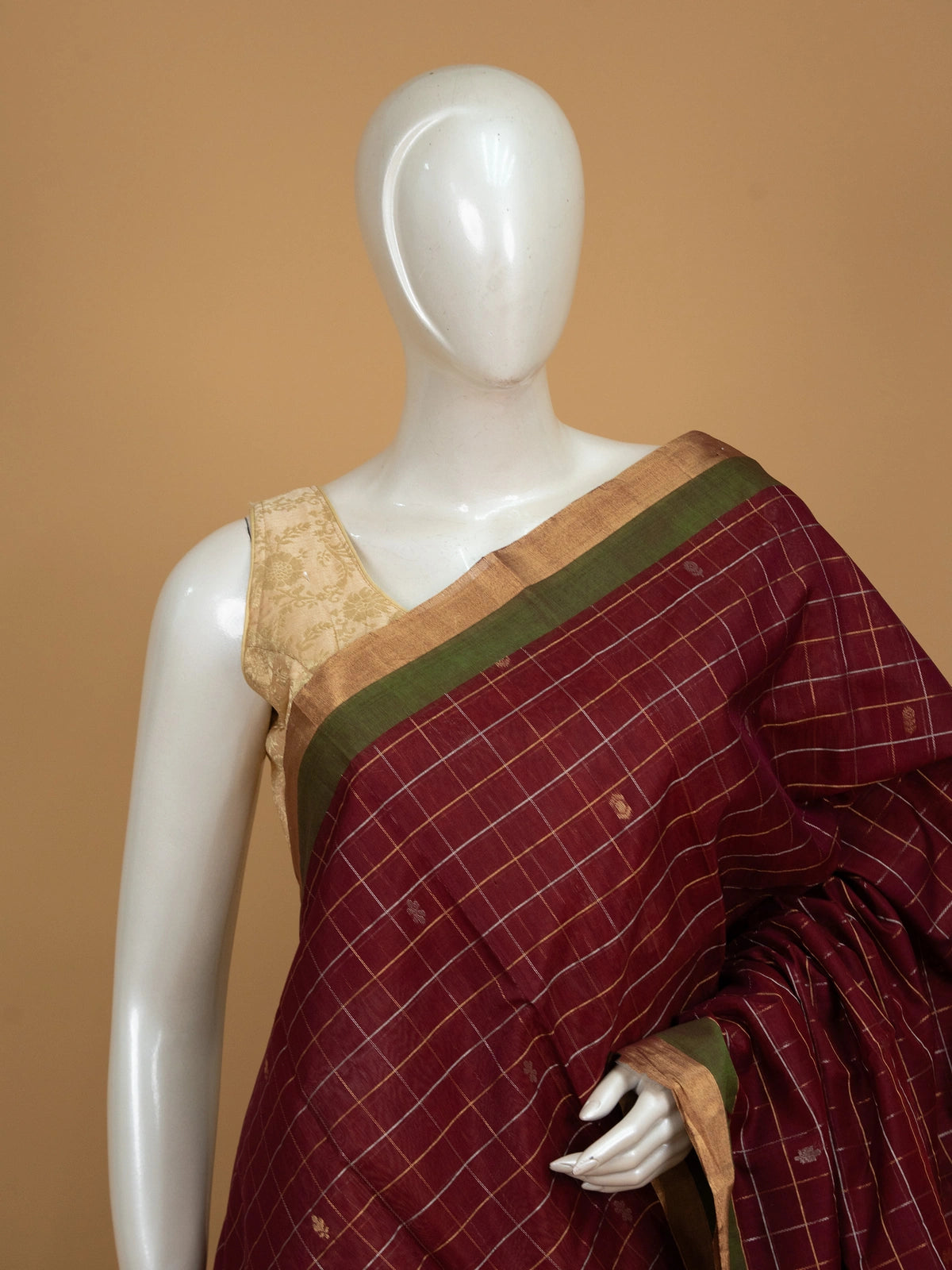Maroon pure silk cotton saree with gold zari checks and contrast olive-green zari border and pallu