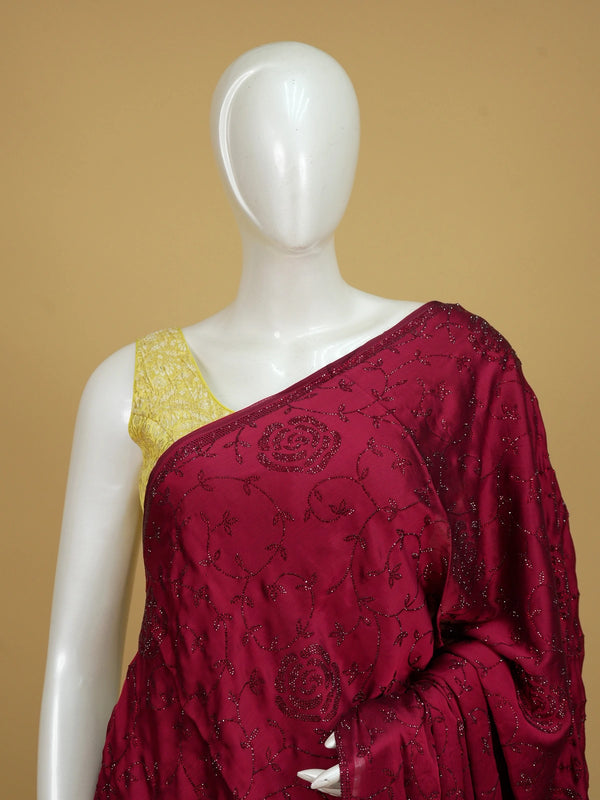 Wine maroon designer georgette saree with tonal floral rose stone work and tasselled pallu