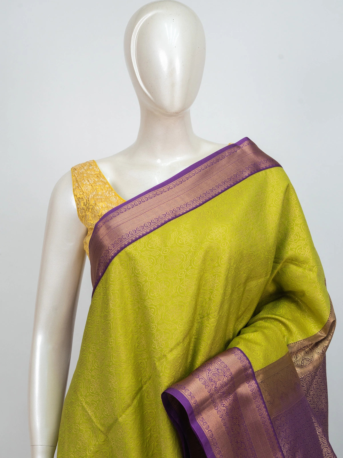 Lime green Kanchipuram Fancy Silk saree with contrast purple gold zari border and pallu