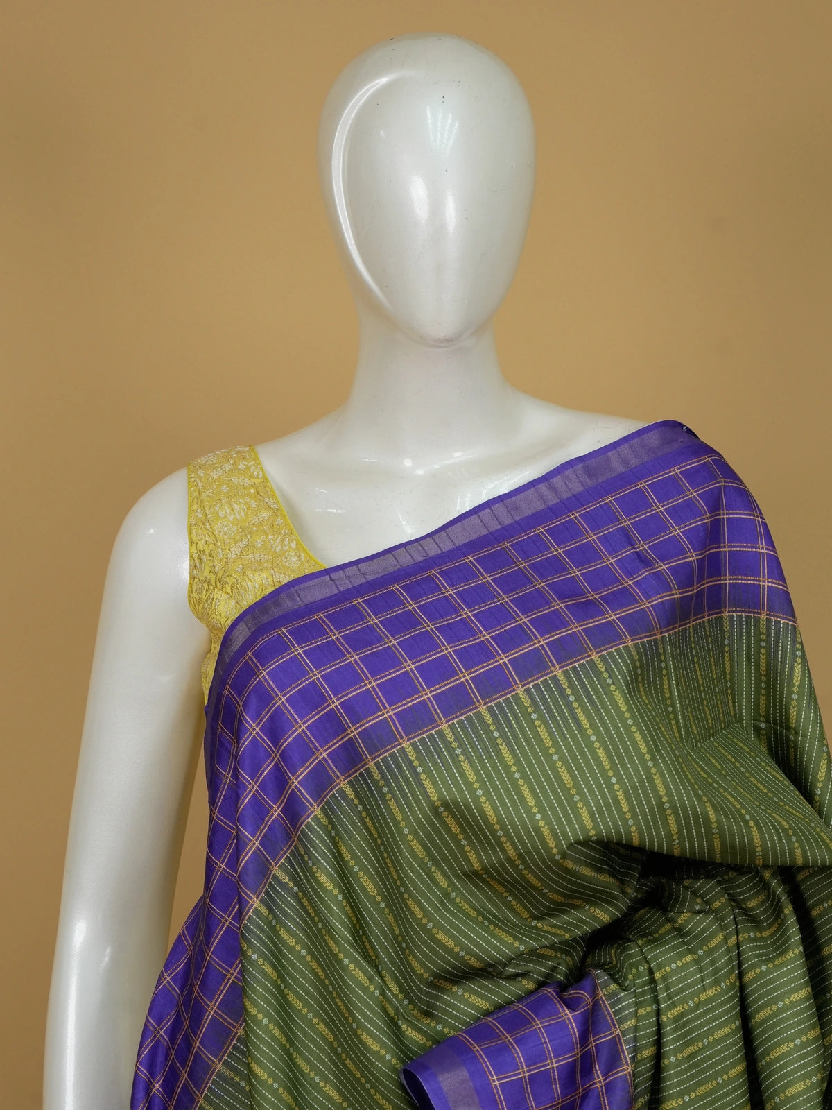 Olive green Dola silk saree with contrast violet checked zari border and geometric gold zari pallu