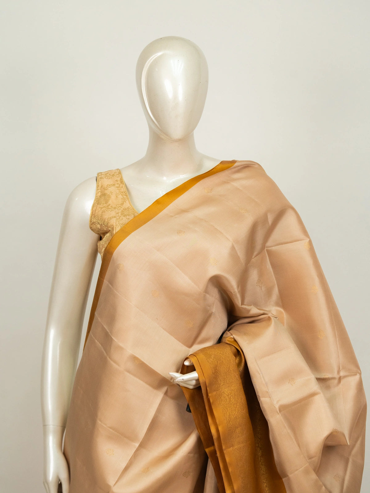 Cream Kanchipuram Pure Mix saree with mustard-gold zari border and pallu