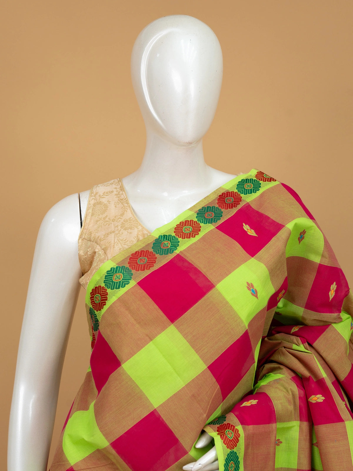 Pink and green checked Chettinad cotton saree with contrast lime-green floral border and woven leaf motifs