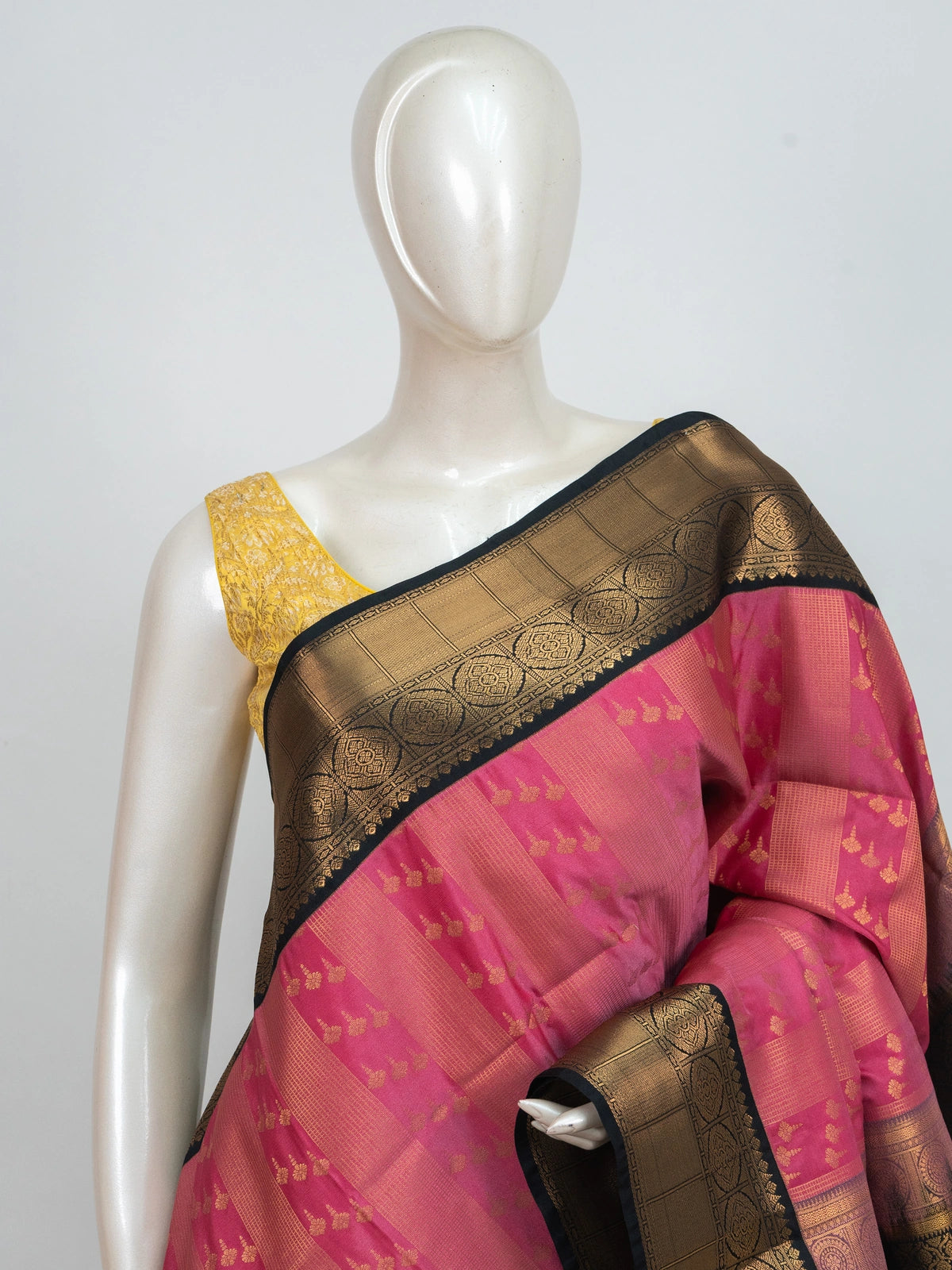 Pink Kanchipuram fancy silk saree with contrast black and gold zari border and pallu