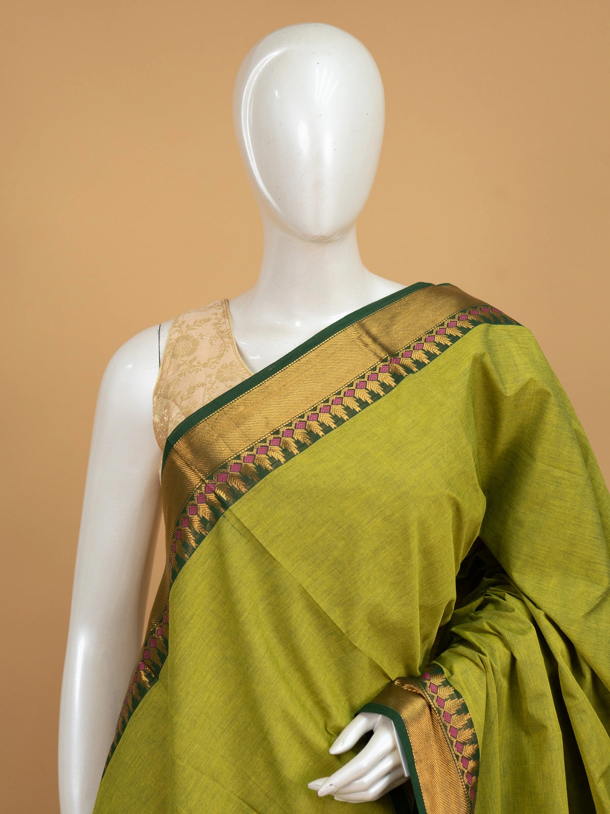 Mehndi green Chettinad cotton saree with contrast dark green gold zari border and striped pallu