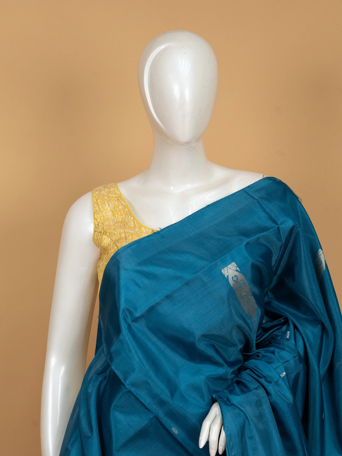 Peacock teal blue Banana Silk saree with silver zari buttas and contrast silver-grey pallu