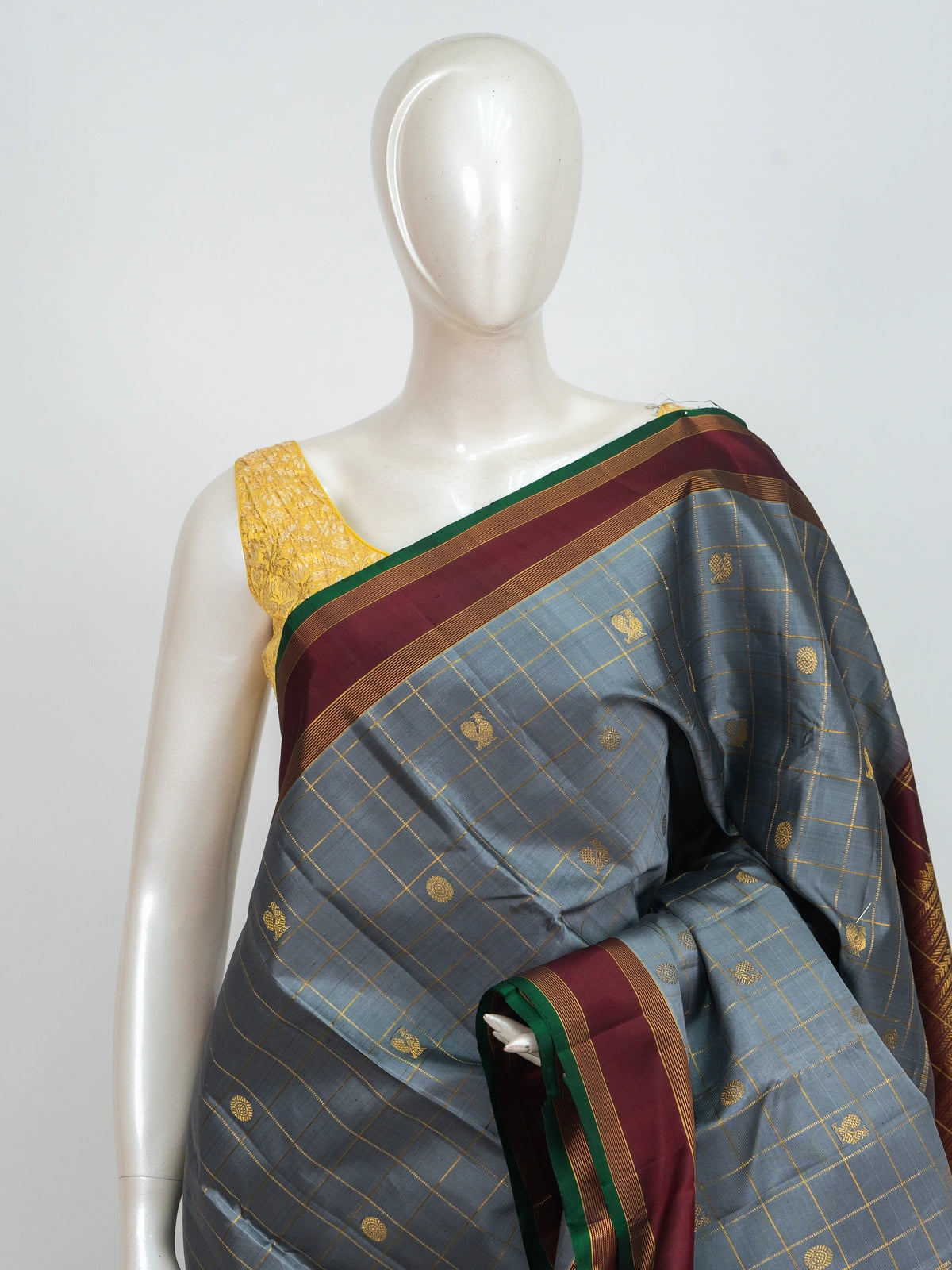 Grey pure Kanchipuram silk saree with gold zari checks, contrast maroon border and ornate zari pallu