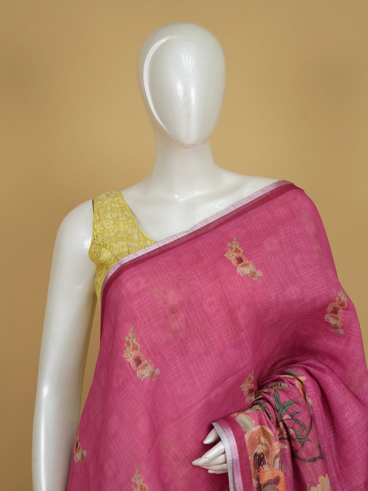 Pink floral linen cotton saree with watercolour floral pallu and silver zari border