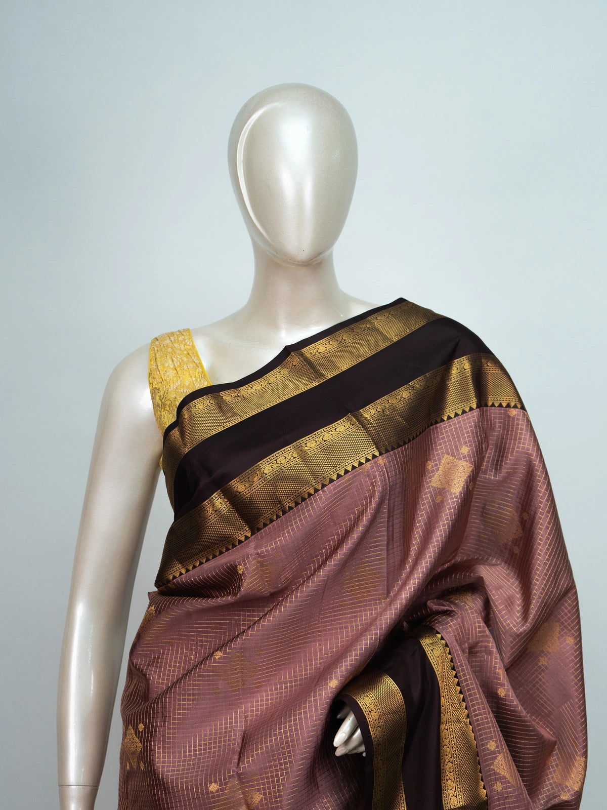 Onion pink pure Kanchipuram silk saree with checked body, gold zari buttas and contrast maroon zari border